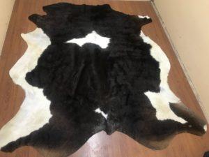 Dark Brown/White cow hide - ecoVert